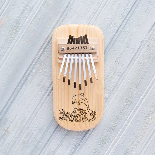 Dolphin Engraved Thumb Piano