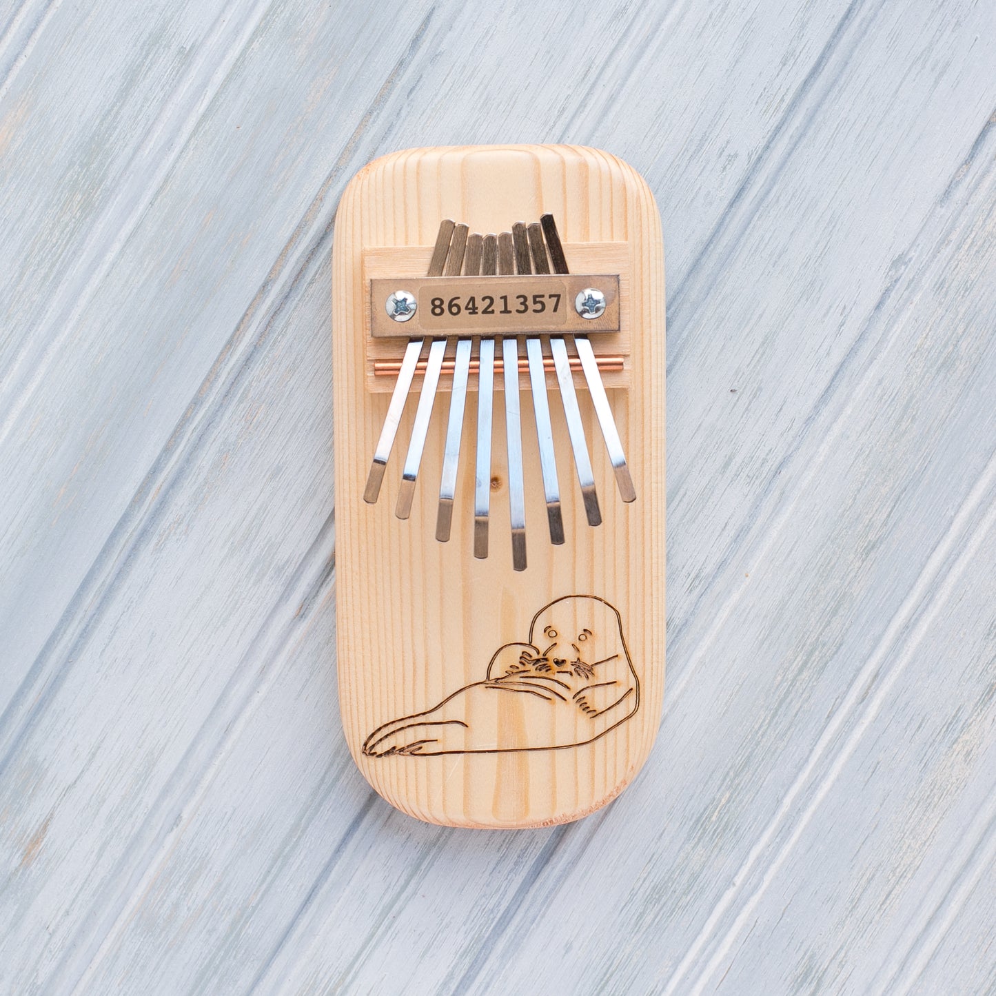 Seal Engraved Thumb Piano