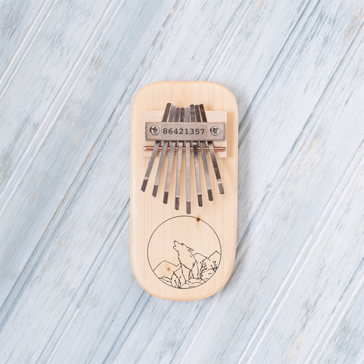 Wolf Engraved Thumb Piano